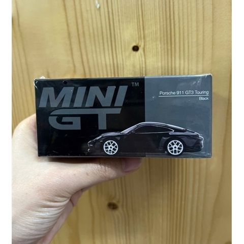  Xe mô hình MINI GT 1/64 Porsche 911 (992) GT3 Touring Black Left Handle 