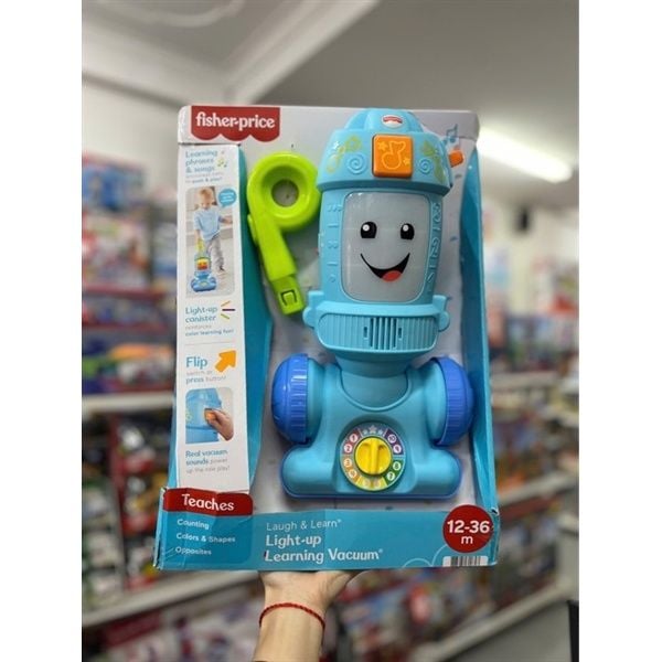 FNR97 - Fisher-Price Laugh & Learn Light-Up Learning Vacuum Cleaner