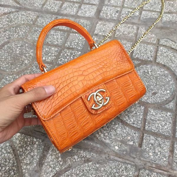 Túi nữ đi tiệc đi chơi bao sang. Da bụng cá sấu vàng bò!