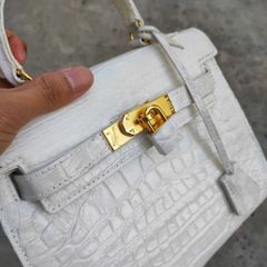 Túi xách Cá sấu nữ có dây đeo vai. Màu trắng bạch tạng nữ tính!