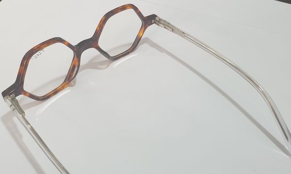  Gọng nhựa Tus' dáng  lục giác FG 1214 