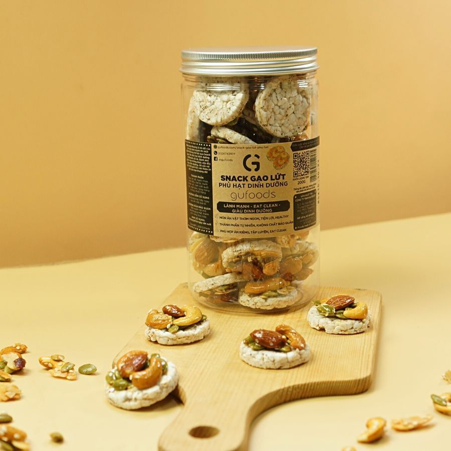 Snack Gạo Lứt Phủ Granola Siêu Hạt GUfoods 200g -Thực Phẩm Bổ Sung Dinh Dưỡng Cho Mẹ Bầu, Sau Sinh, Người Ăn Chay, Ăn Kiêng, Giảm Cân, Eat Clean, Tập Gym, Hàm Lượng Giàu Protein, Omega 3 Và Chất Xơ (Thanh Hạt Và Bánh)