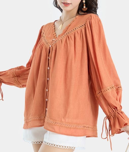  Áo form rộng phối ren tay phồng 