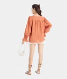  Áo form rộng phối ren tay phồng 