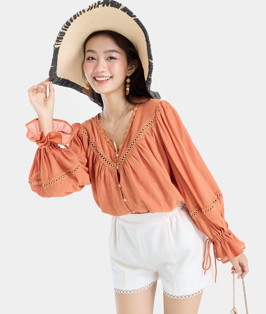  Áo form rộng phối ren tay phồng 