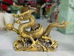 Tượng Linh Vật - Rồng Đồng Vàng Nhả Ngọc Lướt Sóng Kích Thước Ngang 33cm, cao 20cm