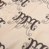  Chân Váy Xếp Ly Monogram Madmind - Màu Be 