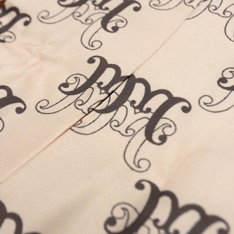  Chân Váy Xếp Ly Monogram Madmind - Màu Be 