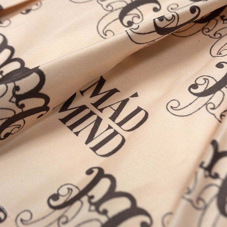  Chân Váy Xếp Ly Monogram Madmind - Màu Be 