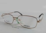 Gọng kính titanium  màu vàng tây nhẹ Seiko (made in Japan)(Mới chưa sử dụng) 