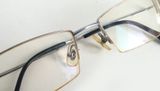  Gọng kính titanium nửa viền màu bạch kim mạ vàng 18K. 
