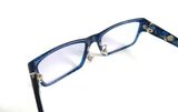  Gọng kính màu xanh tím than Leo thương hiệu Zoff. 