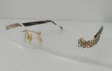  Gọng kính nữ 3 mảnh mạ vàng 23k thương hiệu Daniel Swarovski (s134 21 6053)(Made in Austria). 
