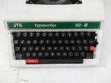  Máy đánh chữ màu trắng cổ điển hàng chục năm tuổi JTS (Xuất xứ Nhật Bản). 