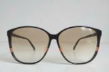  Kính râm gọng màu đen vân đá quý Renoma Guadeloupe Paris hàng chục năm tuổi. 