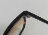  Kính râm gọng màu đen vân đá quý Renoma Guadeloupe Paris hàng chục năm tuổi. 