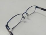  Gọng kính titanium màu xanh than hun khói Police (mã vpl423j) chuẩn xịn. 