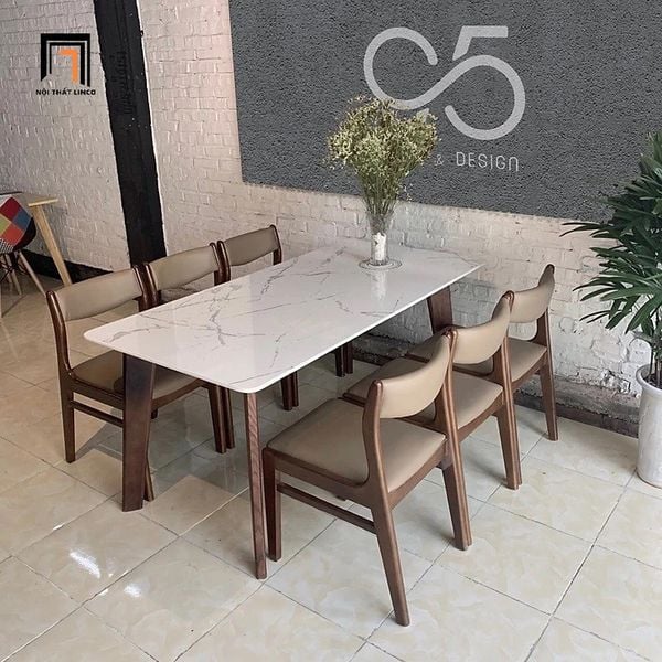 bộ bàn ăn 6 ghế ngồi bọc nệm da giả