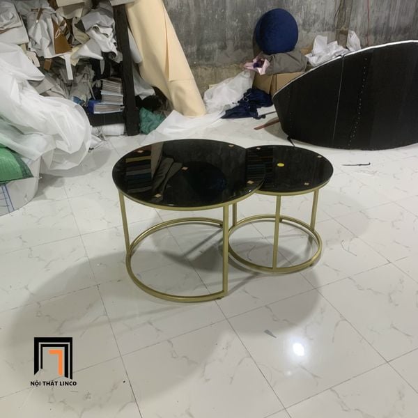 cặp bàn sofa phòng khách kính đen
