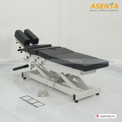 Giường nắn chỉnh cột sống chỉnh điện 6 khúc 4 cần gạt HERAB-2040