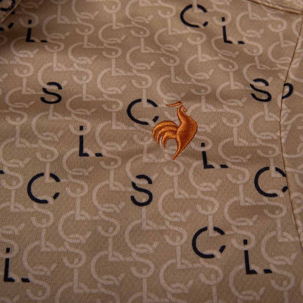 Áo golf nam Le Coq Sportif màu beige, phong cách tinh tế và thoải mái.