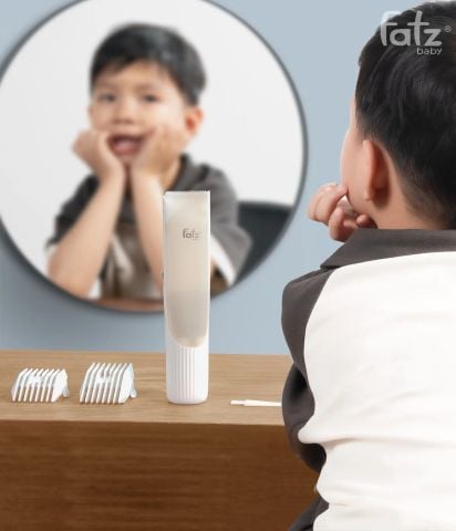 Tông đơ cắt tóc & tự động hút tóc an toàn cho bé Trim 4 FB7901HB