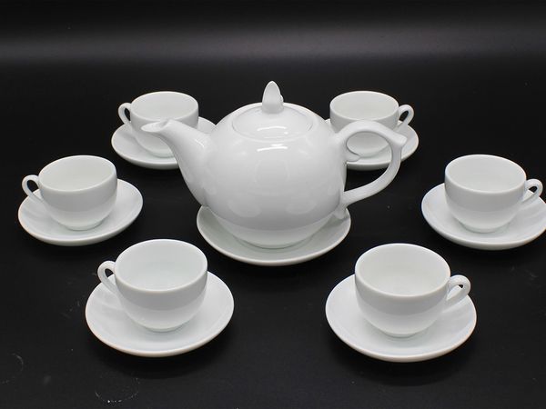 Ấm chén Bát Tràng làm quà tặng dáng chóp lửa men trắng
