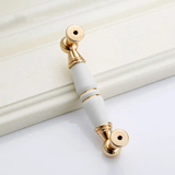  Tay nắm tủ gốm sứ vàng trắng (cái) 