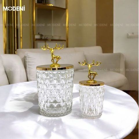 Set 2 lọ thuỷ tinh Patronus cao cấp với nắp tuần lộc đặt trên bàn tiếp khách hiện đại
