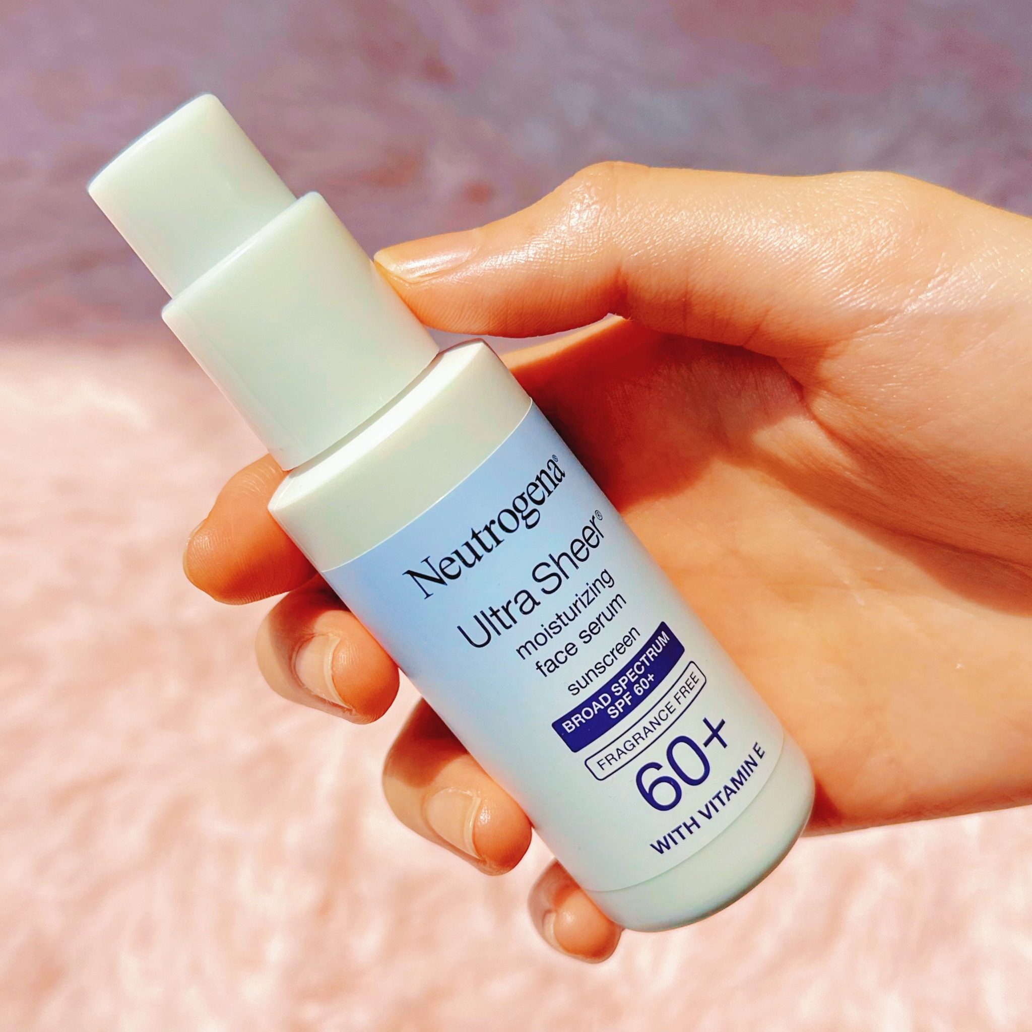 Neutrogena® Ultra Sheer® Moisturizing Face Serum with Vitamin E SPF 60+