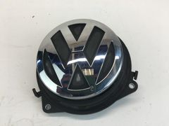 Nút mở cửa nắp hậu phía sau cho Volkswagen Passat Sedan từ năm 2007 đến 2010, có logo, hàng tháo xe US. Mã 6R0827469E, 6R0-827-469-E, 6R0 827 469 E.