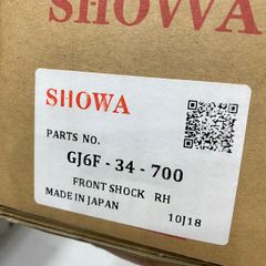 Gảm xóc trước Mazda 6 bên phụ đời 2004 - 2006. Hàng Showa Japan. Mã GH6F-34-700, GH6F34700.