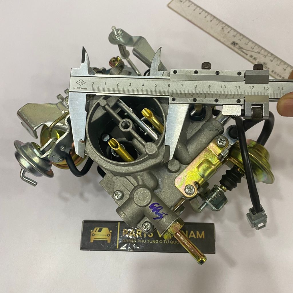 Chế hòa khí, bình xăng con Corolla 1.3 động cơ 2E đời 1987 - 1993. Hàng Taiwan. Mã 21100-11850, 2110011850.
