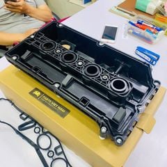 Nắp dàn cò, dàn cam Chevrolet Cruze 1.8 xe trong nước đời 2008 - 2012. Hàng GM Shanghai. Mã 55564395, 96889998