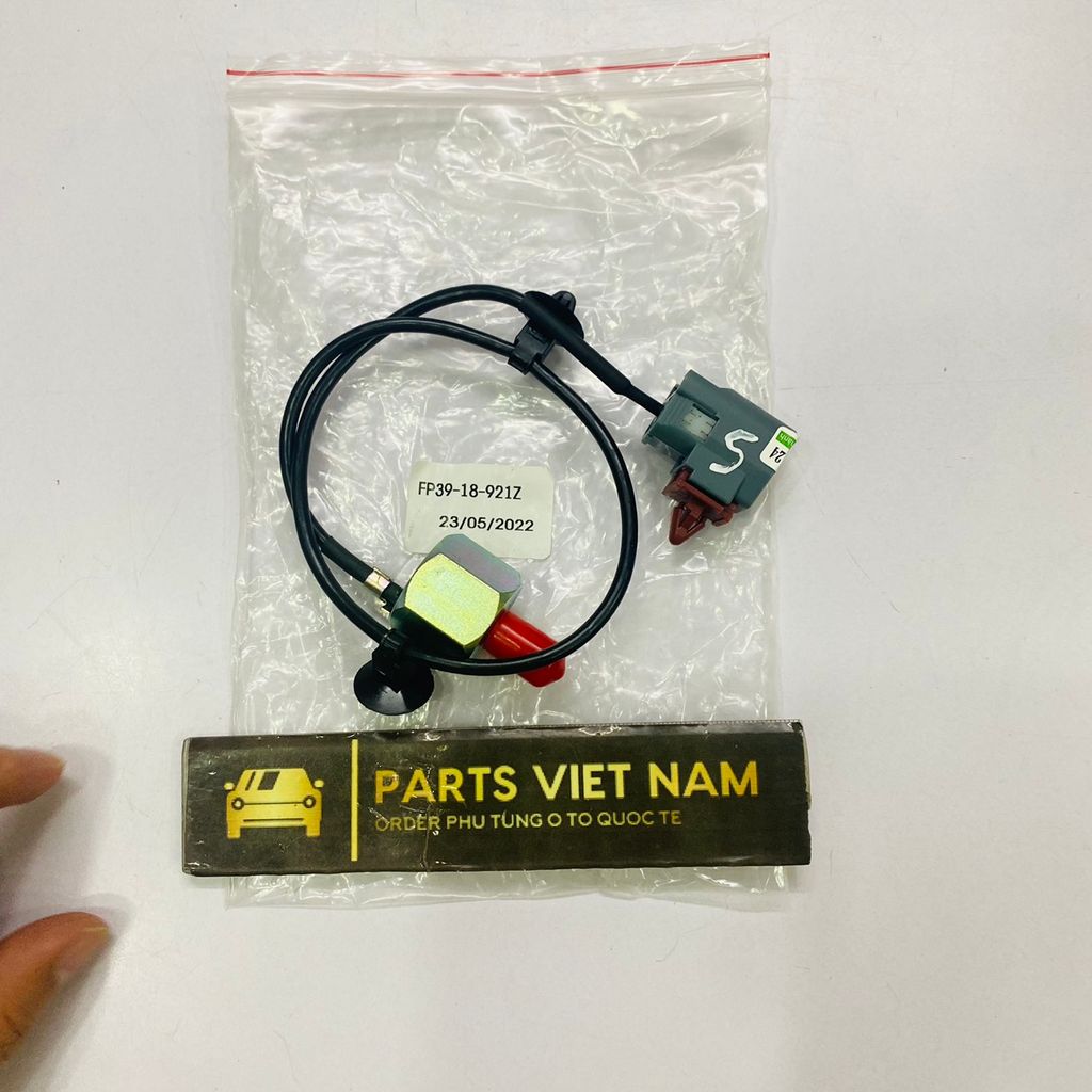 Cảm biến tiếng gõ động cơ hay kích nổ Ford Laser 1.6 và 1.8 đời 2001 - 2005. Hàng cao cấp. Mã FP39-18-921Z, FP3918921Z
