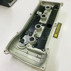 Nắp đậy giàn cò hay dàn cam Toyota Camry 2.4 động cơ 2AZ ACV40, Rav4 động cơ 1AZ hay 2AZ đời 2006 - 2011. Hàng cao cấp. Mã 11201-0H060, 112010H060