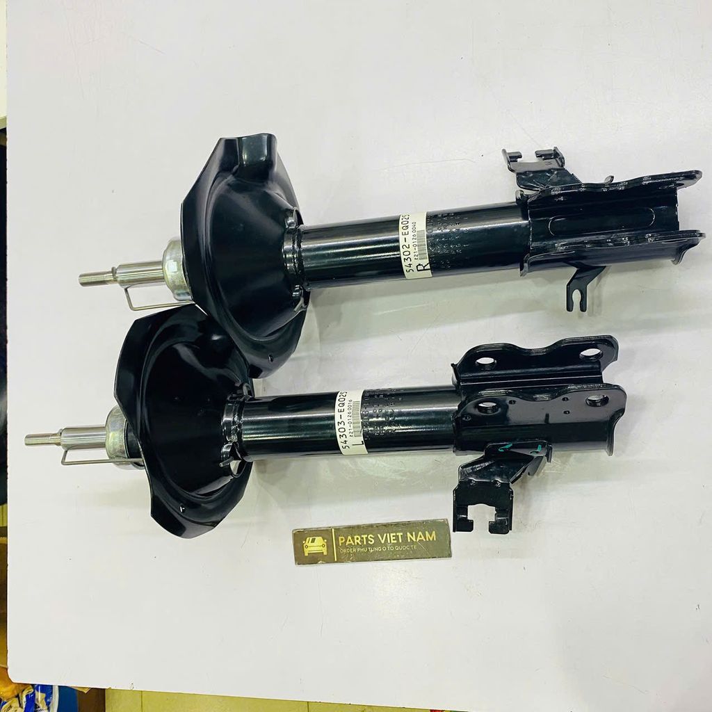 Giảm xóc trước hay phuộc trước Nissan Xtrail, X-Trail T30 đời 2003 - 2013. Hàng Showa Japan. Thay 1 đôi bảo hành 6 tháng. Mã 54302-EQ025, 54303-EQ025 ( 1 cái )