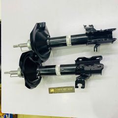 Giảm xóc trước hay phuộc trước Nissan Xtrail, X-Trail T30 đời 2003 - 2013. Hàng Showa Japan. Thay 1 đôi bảo hành 6 tháng. Mã 54302-EQ025, 54303-EQ025 ( 1 cái )