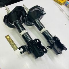 Giảm xóc trước hay phuộc trước Nissan Xtrail, X-Trail T30 đời 2003 - 2013. Hàng Showa Japan. Thay 1 đôi bảo hành 6 tháng. Mã 54302-EQ025, 54303-EQ025 ( 1 cái )