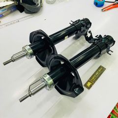 Giảm xóc trước hay phuộc trước Nissan Xtrail, X-Trail T30 đời 2003 - 2013. Hàng Showa Japan. Thay 1 đôi bảo hành 6 tháng. Mã 54302-EQ025, 54303-EQ025 ( 1 cái )