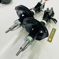 Giảm xóc trước hay phuộc trước Nissan Xtrail, X-Trail T30 đời 2003 - 2013. Hàng Showa Japan. Thay 1 đôi bảo hành 6 tháng. Mã 54302-EQ025, 54303-EQ025 ( 1 cái )