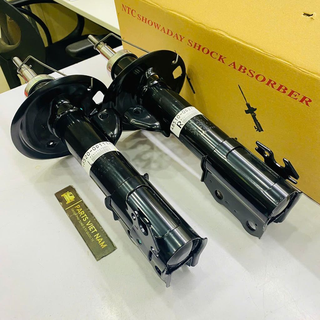 Giảm xóc hoặc phuộc trước Toyota Vios, Yaris đời 2008 - 2013. Hàng Showa Japan, thay 1 đôi bảo hành 6 tháng. Mã 48510-0D490 RH, 48510-0D490 LH, 485100D490 RH, 485100D490 LH ( 1 đôi )