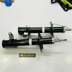 Giảm xóc, nhún sau hay phuộc sau Ford Laser 1.6 và 1.8 đời 2000 đời 2005. Hàng Showa Japan, Thay 1 đôi bảo hành 6 tháng. Mã BL5P-28-700, BL5P-28-900, BL5P28700, BL5P28900. ( 1 đôi )