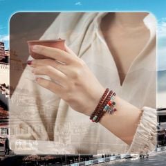 Vòng Garnet 4 li cuốn 3 mix Ngọc lam và charm Om mani (TRS VHM 072 )