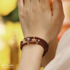 Vòng garnet cuốn 3 mix  charm cầu khắc chú Om Mani