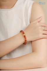 Vòng thạch anh tóc đỏ 8 li mix trụ Om mani vàng (TRSV VHM 235-1 )