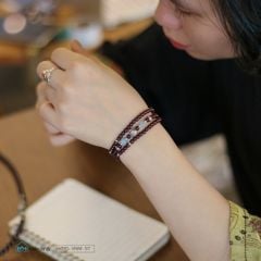 Vòng garnet cuốn 3 mix  charm cầu khắc chú Om Mani