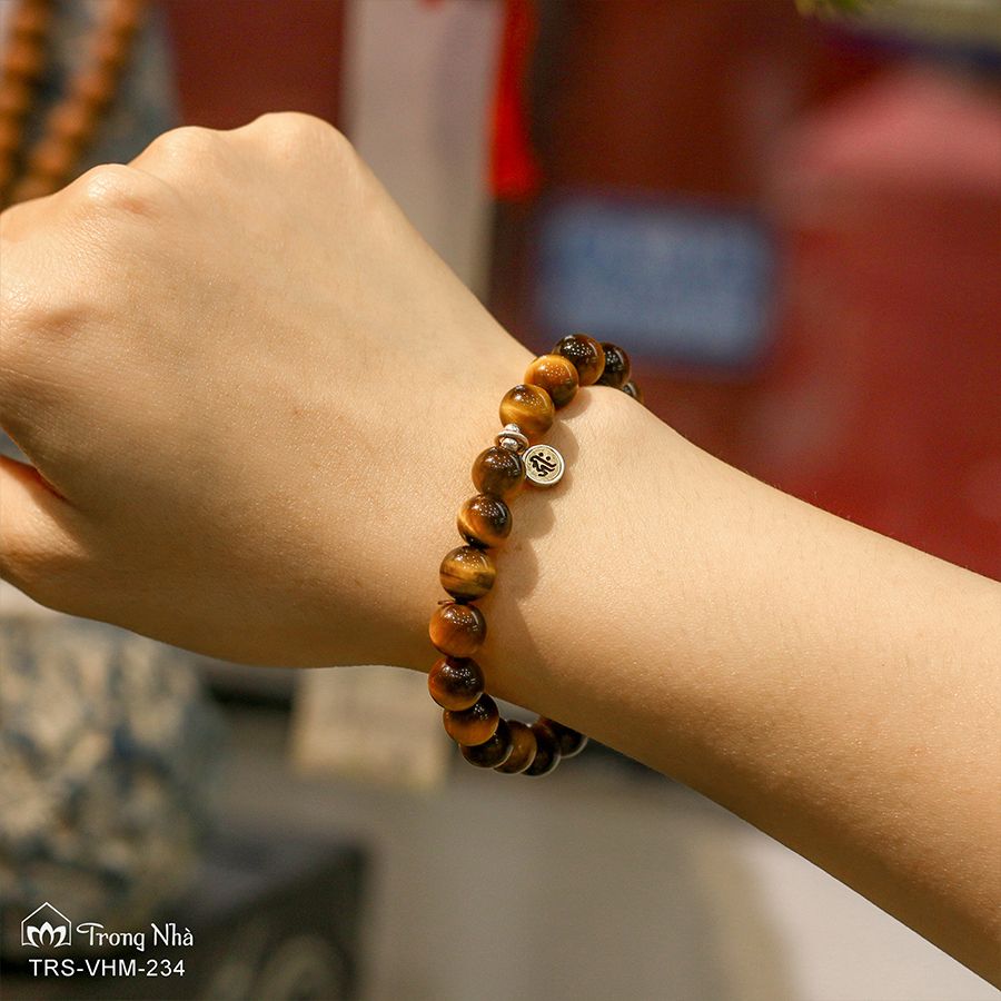 Vòng mắt hổ vàng nâu charm khắc chú Om mani  padme hum xoay (TRS VHM 234)
