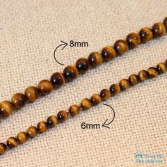 Tràng hạt mắt hổ vàng nâu mix ngọc hòa điền khắc Quan âm tứ thủ (TRS VHM 526)