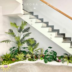 Tiểu cảnh cây cảnh giả trang trí chân cầu thang phòng khách